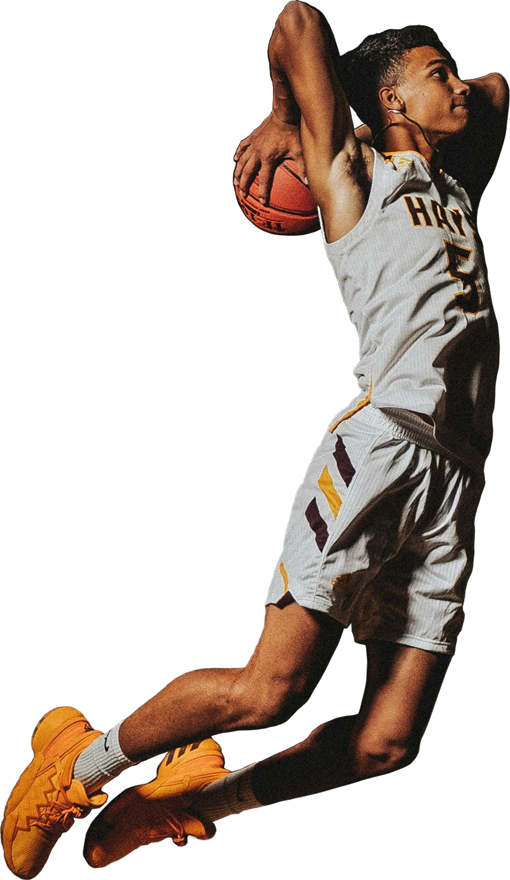 College basketball player dunking